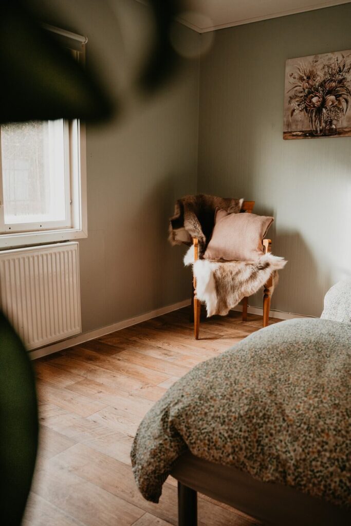 Chair in two-person bedroom at Stuga Värmland
